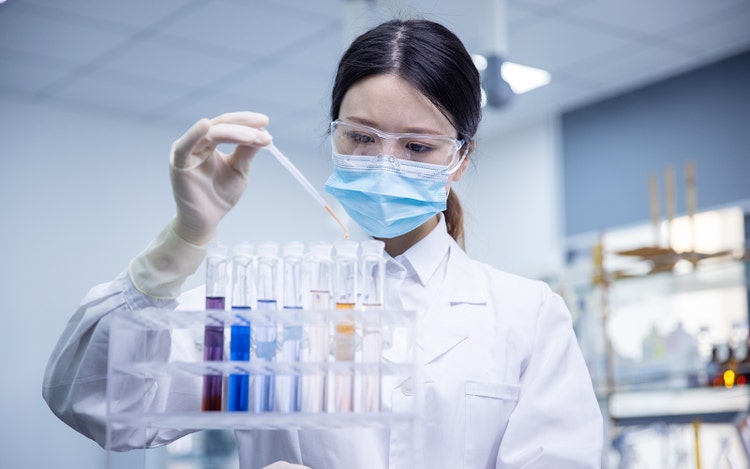 Scientist in the lab using technical instrument