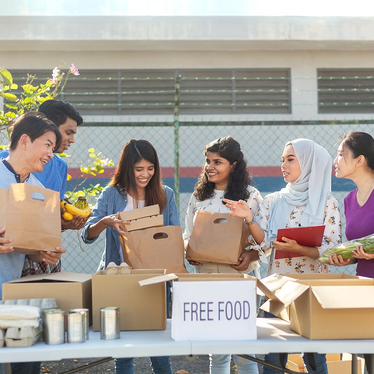 Group of people giving food